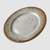 Plate_reproduction_on_grey_backg…_202608051220 Assiette plate ronde émaillé rustique (Ø23 cm)